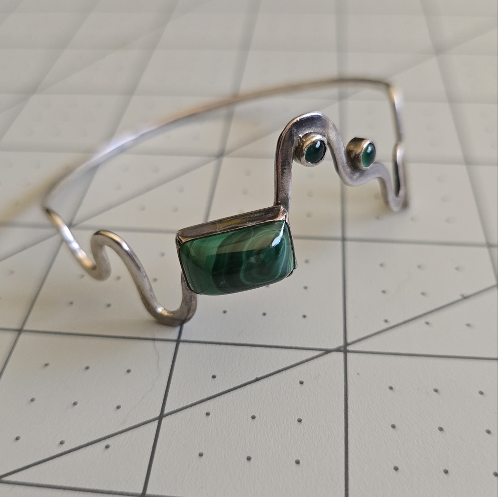 Charming Sterling Silver Wave Bangle with Green Stones